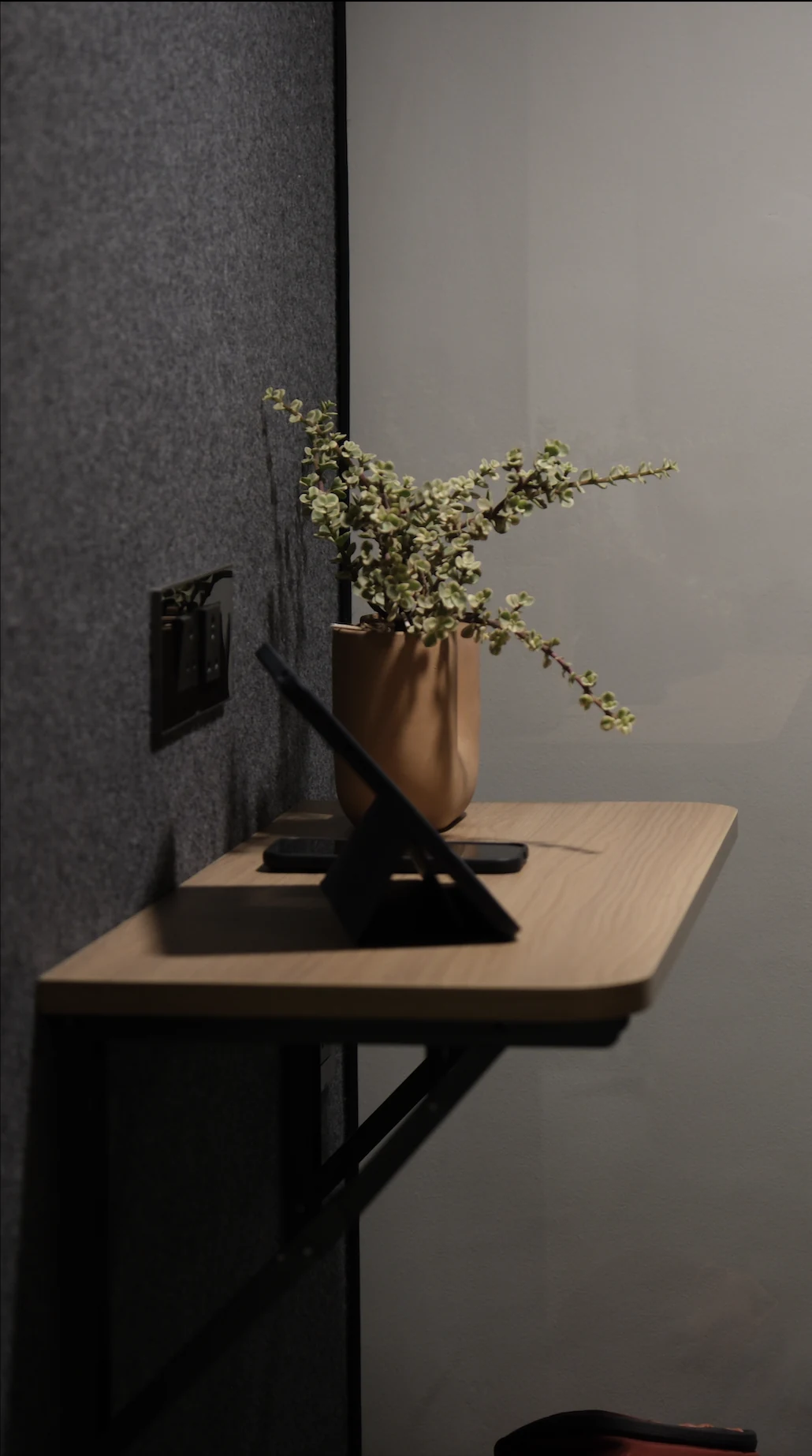 Desk with iPad stand and plant